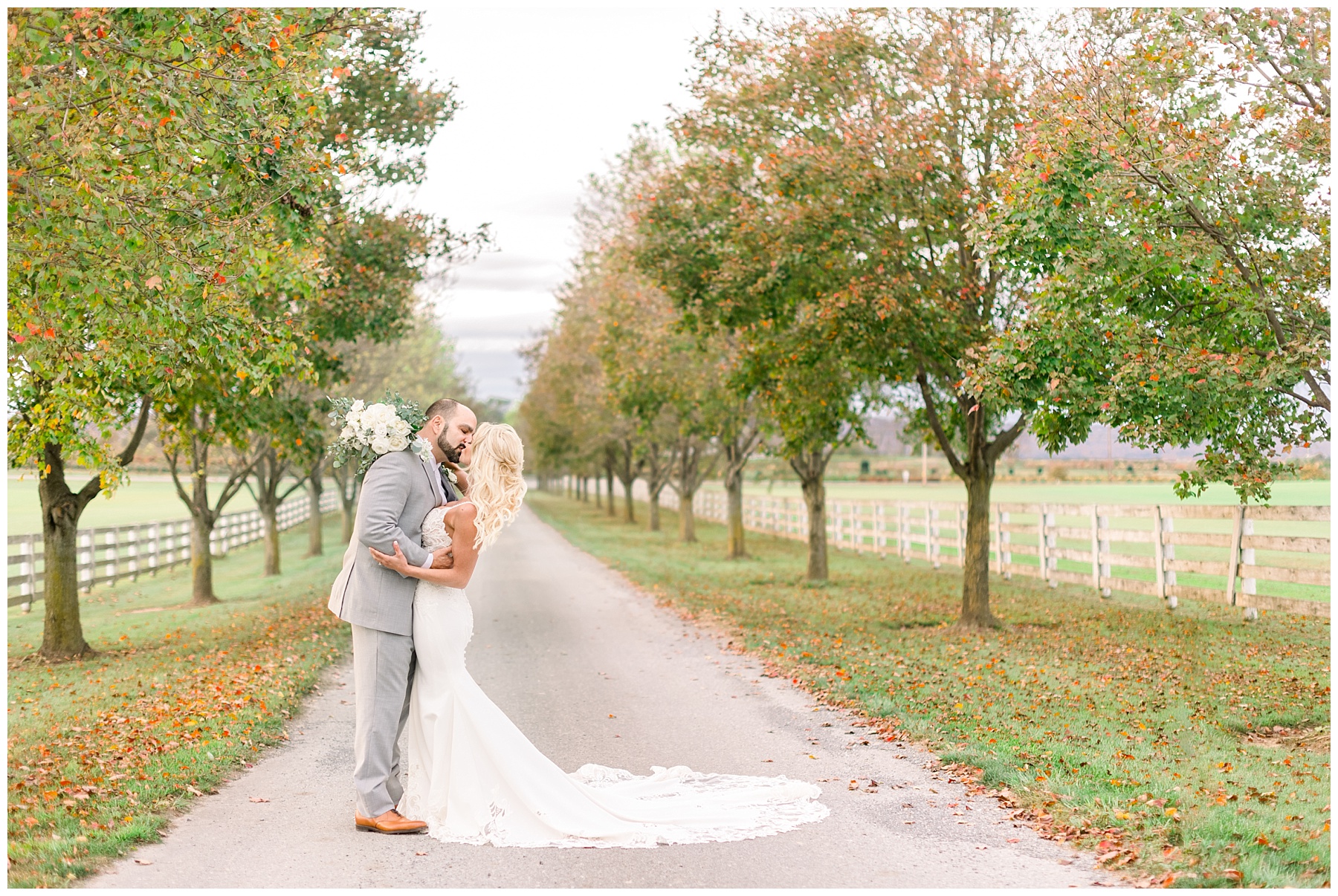 Bride and groom sharing a kiss during their Bluebird Manor wedding