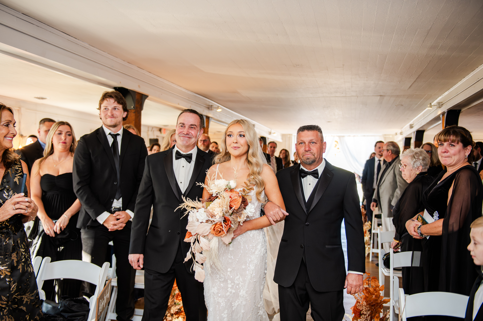 Bride walking down the aisle at Bluebird Manor wedding