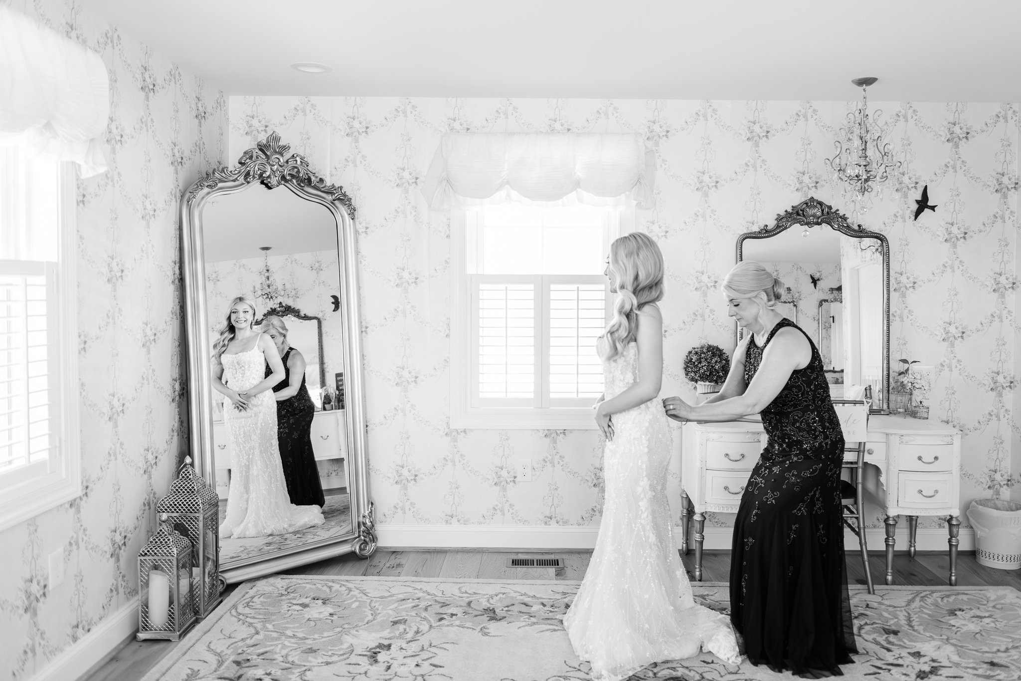 Bride getting ready with her mother before a Bluebird Manor wedding