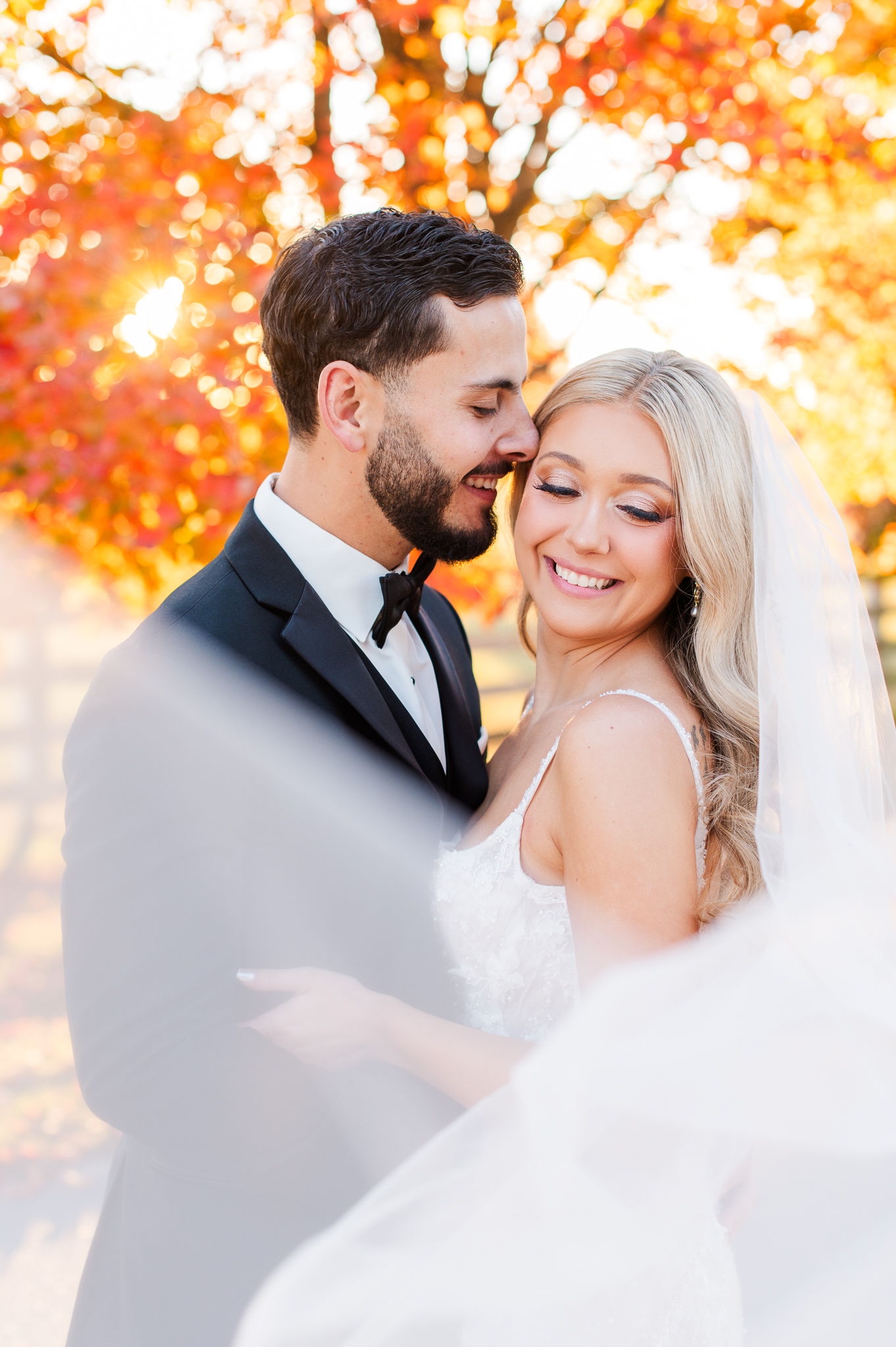 Bride and groom veil portraits at Bluebird Manor in Maryland