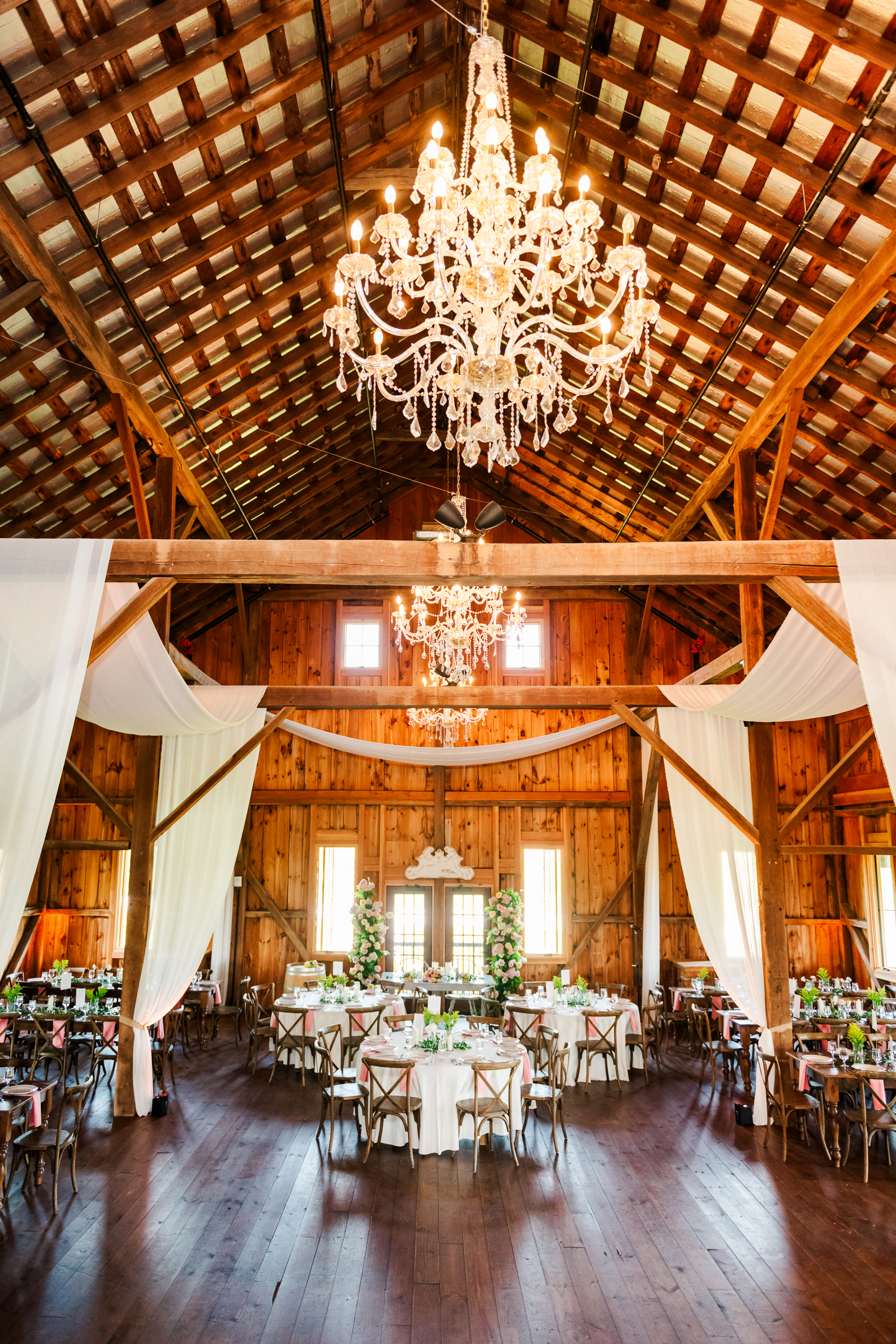 Wedding reception setup inside the Bluebird Manor barn