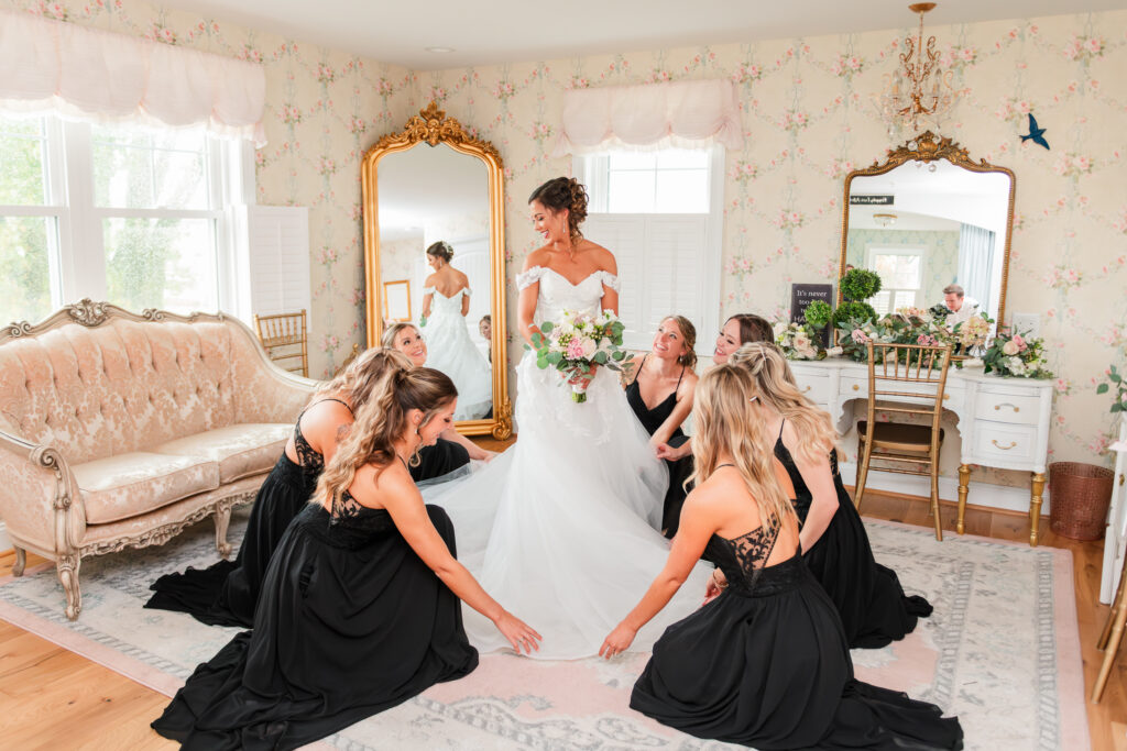 Bride with bridesmaids inside The Nest bridal suite 