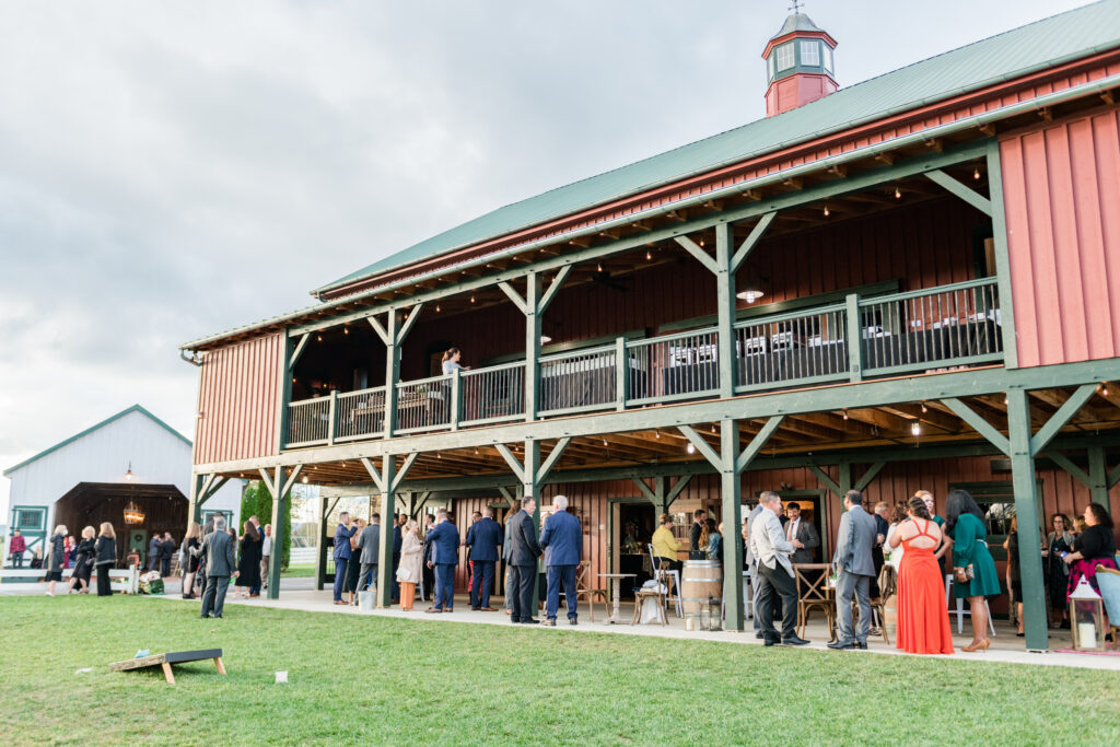 Guests enjoying cocktail hour on the Bluebird Manor porch